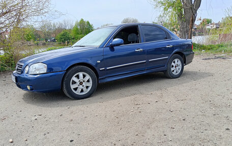 KIA Magentis I, 2004 год, 450 000 рублей, 10 фотография