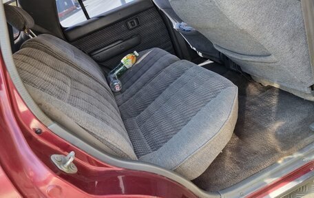 Toyota Hilux Surf III рестайлинг, 1992 год, 380 000 рублей, 24 фотография