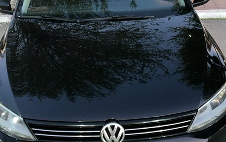 Volkswagen Jetta VI, 2013 год, 980 000 рублей, 1 фотография