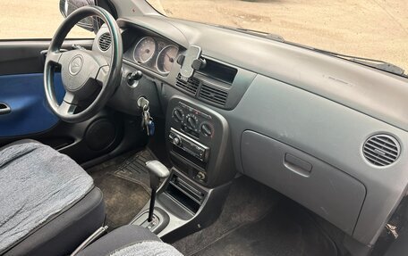 Daihatsu Cuore VI, 2005 год, 219 789 рублей, 9 фотография