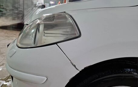 Nissan Tiida, 2010 год, 650 000 рублей, 7 фотография