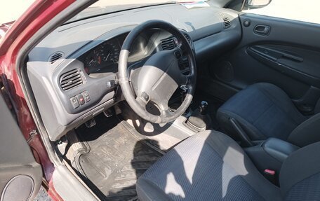 Mazda 323, 1996 год, 150 000 рублей, 5 фотография