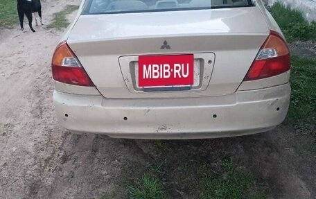 Mitsubishi Mirage VI рестайлинг, 1999 год, 150 000 рублей, 4 фотография