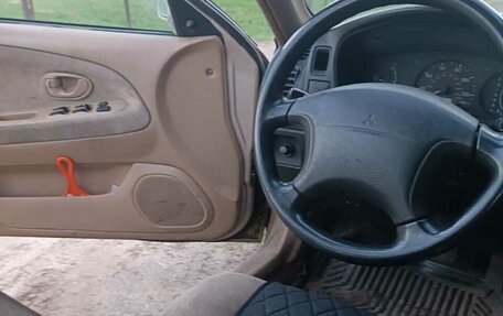 Mitsubishi Mirage VI рестайлинг, 1999 год, 150 000 рублей, 10 фотография