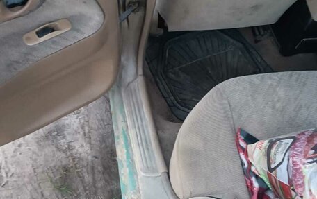 Mitsubishi Mirage VI рестайлинг, 1999 год, 150 000 рублей, 9 фотография