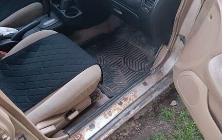 Mitsubishi Mirage VI рестайлинг, 1999 год, 150 000 рублей, 13 фотография