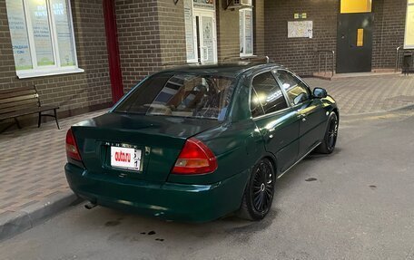 Mitsubishi Mirage VI рестайлинг, 2000 год, 250 000 рублей, 4 фотография