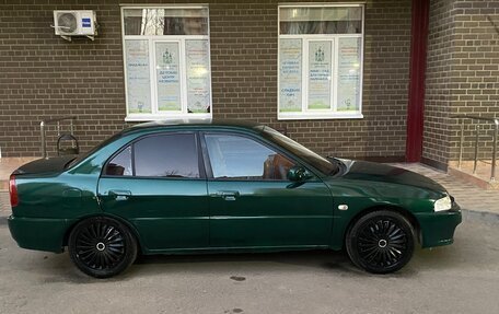 Mitsubishi Mirage VI рестайлинг, 2000 год, 250 000 рублей, 5 фотография