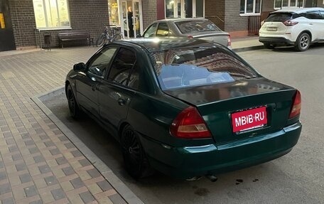 Mitsubishi Mirage VI рестайлинг, 2000 год, 250 000 рублей, 3 фотография