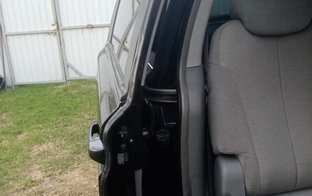 KIA Carnival III, 2008 год, 900 000 рублей, 7 фотография