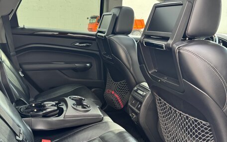 Cadillac SRX II рестайлинг, 2011 год, 950 000 рублей, 9 фотография