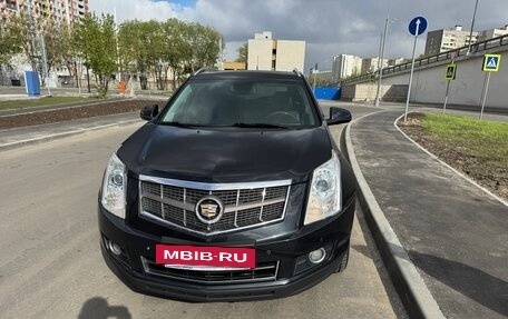 Cadillac SRX II рестайлинг, 2011 год, 950 000 рублей, 3 фотография