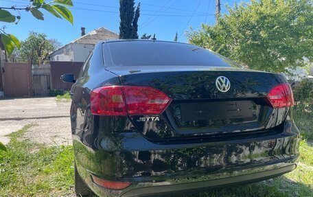 Volkswagen Jetta VI, 2012 год, 900 000 рублей, 2 фотография