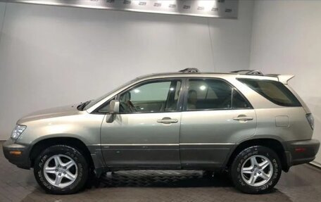 Lexus RX IV рестайлинг, 2001 год, 940 000 рублей, 3 фотография