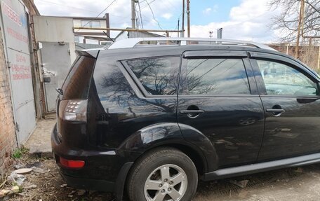 Mitsubishi Outlander III рестайлинг 3, 2010 год, 950 000 рублей, 2 фотография