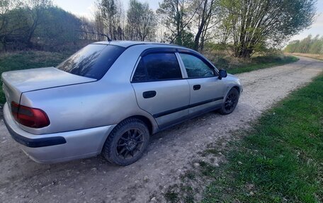 Mitsubishi Carisma I, 2003 год, 210 000 рублей, 7 фотография