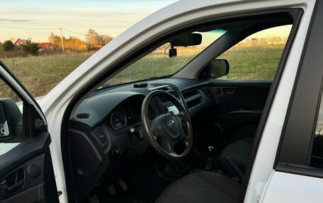KIA Sportage II, 2010 год, 1 050 000 рублей, 14 фотография