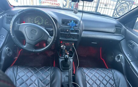 Mazda 323, 1997 год, 260 000 рублей, 12 фотография