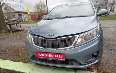 KIA Rio III рестайлинг, 2011 год, 900 000 рублей, 4 фотография