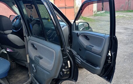 Chevrolet Tracker II, 1999 год, 400 000 рублей, 8 фотография
