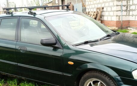 Mazda 323, 1999 год, 200 000 рублей, 2 фотография
