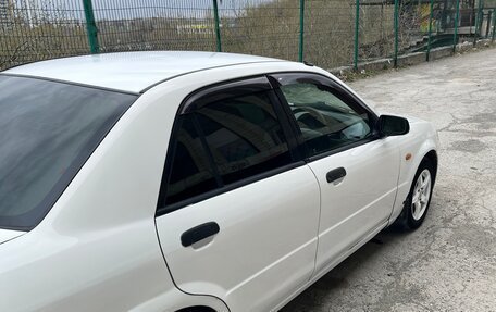 Mazda Familia, 2002 год, 310 000 рублей, 12 фотография