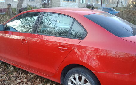 Volkswagen Jetta VI, 2013 год, 1 000 000 рублей, 34 фотография