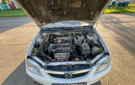 Mazda Familia, 2001 год, 250 000 рублей, 11 фотография