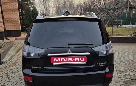 Mitsubishi Outlander III рестайлинг 3, 2008 год, 990 000 рублей, 4 фотография
