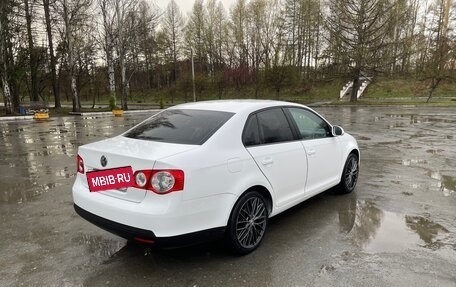 Volkswagen Jetta VI, 2010 год, 700 000 рублей, 3 фотография