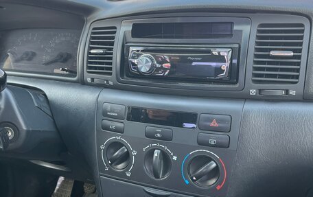 Toyota Corolla, 2004 год, 550 000 рублей, 8 фотография