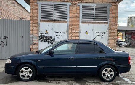 Mazda 323, 1999 год, 400 000 рублей, 8 фотография