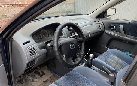Mazda 323, 1999 год, 400 000 рублей, 9 фотография