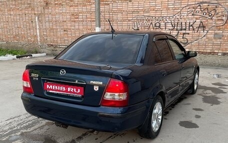 Mazda 323, 1999 год, 400 000 рублей, 5 фотография
