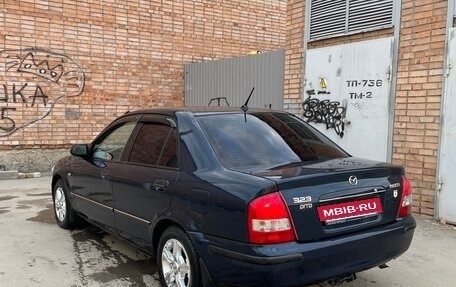Mazda 323, 1999 год, 400 000 рублей, 7 фотография