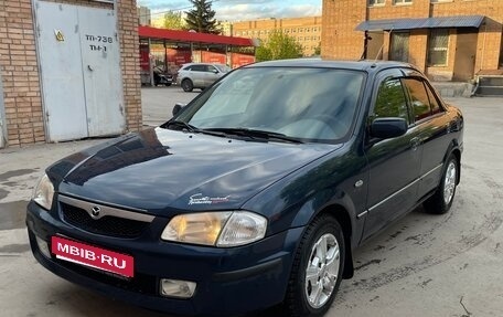Mazda 323, 1999 год, 400 000 рублей, 1 фотография