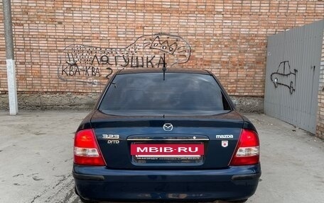 Mazda 323, 1999 год, 400 000 рублей, 6 фотография