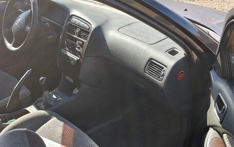 Toyota Avensis III рестайлинг, 1999 год, 300 000 рублей, 10 фотография