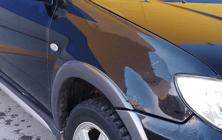 Mitsubishi Outlander III рестайлинг 3, 2005 год, 500 000 рублей, 14 фотография