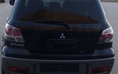 Mitsubishi Outlander III рестайлинг 3, 2005 год, 500 000 рублей, 18 фотография