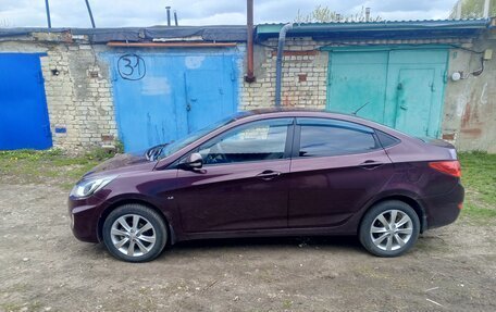Hyundai Solaris II рестайлинг, 2011 год, 760 000 рублей, 13 фотография