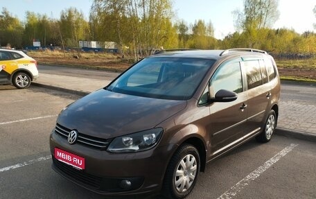 Volkswagen Touran III, 2011 год, 970 000 рублей, 1 фотография