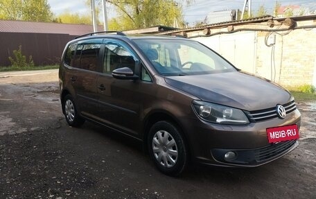 Volkswagen Touran III, 2011 год, 970 000 рублей, 3 фотография