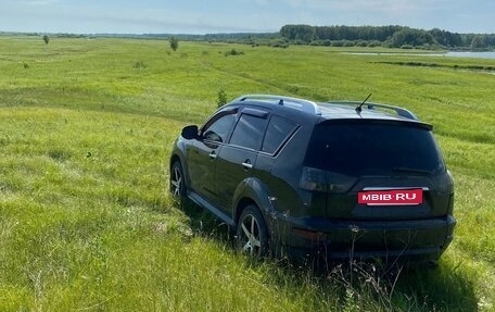 Mitsubishi Outlander III рестайлинг 3, 2010 год, 1 400 000 рублей, 11 фотография