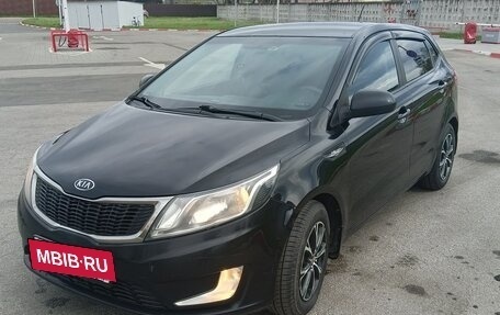 KIA Rio III рестайлинг, 2012 год, 880 000 рублей, 19 фотография