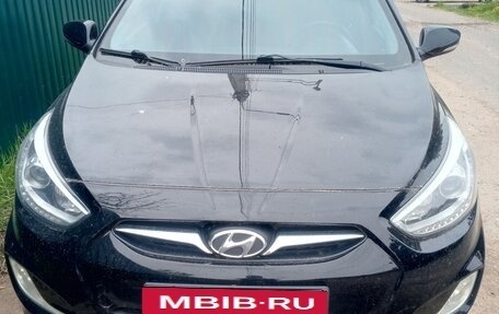 Hyundai Solaris II рестайлинг, 2013 год, 3 фотография