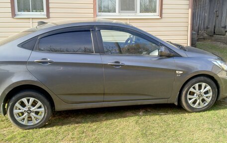 Hyundai Solaris II рестайлинг, 2011 год, 730 000 рублей, 4 фотография