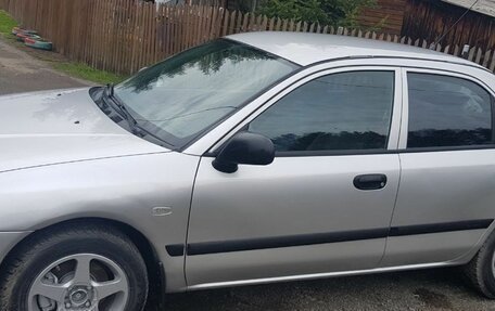 Mitsubishi Carisma I, 2002 год, 350 000 рублей, 8 фотография