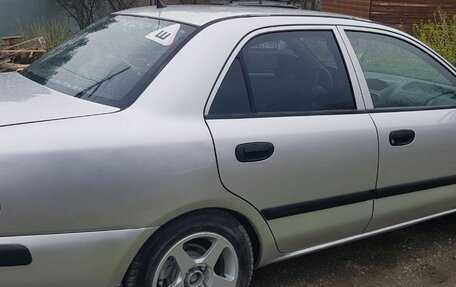 Mitsubishi Carisma I, 2002 год, 350 000 рублей, 40 фотография