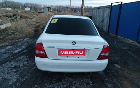 Mazda Familia, 2000 год, 240 000 рублей, 8 фотография